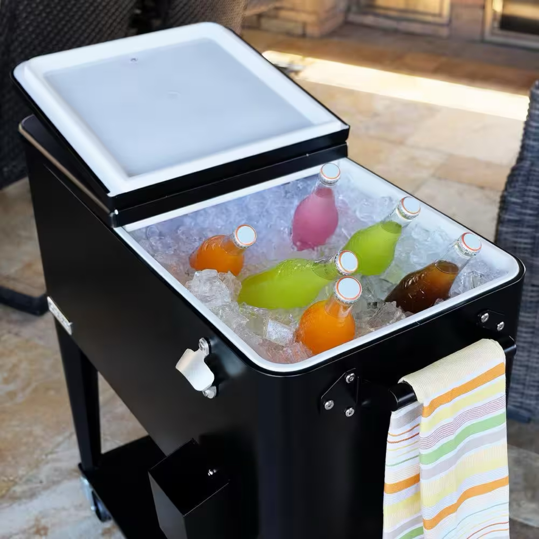 80qt Ice Chest Cooler. This vintage style 80 qt. steel patio cooler cart with bottom shelf will add elegance to any backyard and outdoor patio. 
It holds upto 110 oz. to 12 oz. cans with plenty of room for ice. 

#LTKhome #LTKfamily #LTKSeasonal