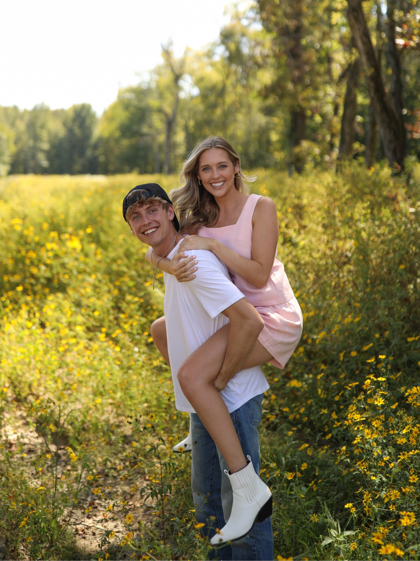 Courtney is wearing this pink two piece shirt set with white booties. Great summer outfit. 