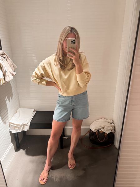 Yellow sweatshirt in the softest material. Tts 
Longer denim shorts tts 
Abercrombie 
Tkees flip-flop sandals (I sized up!) 
Summer outfit 

#LTKSeasonal #LTKFindsUnder100 #LTKFindsUnder50