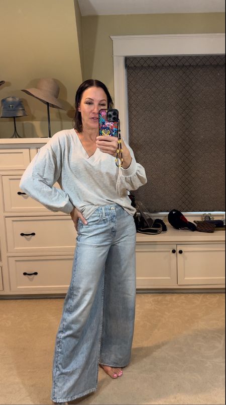 Obsessed with these wide leg jeans from rag and bone! Plus this shirt is so comfortable and I love the cute sleeve detail. Wearing size 25 in jeans and size small in shirt. 

#LTKover40 #LTKstyletip #LTKSeasonal
