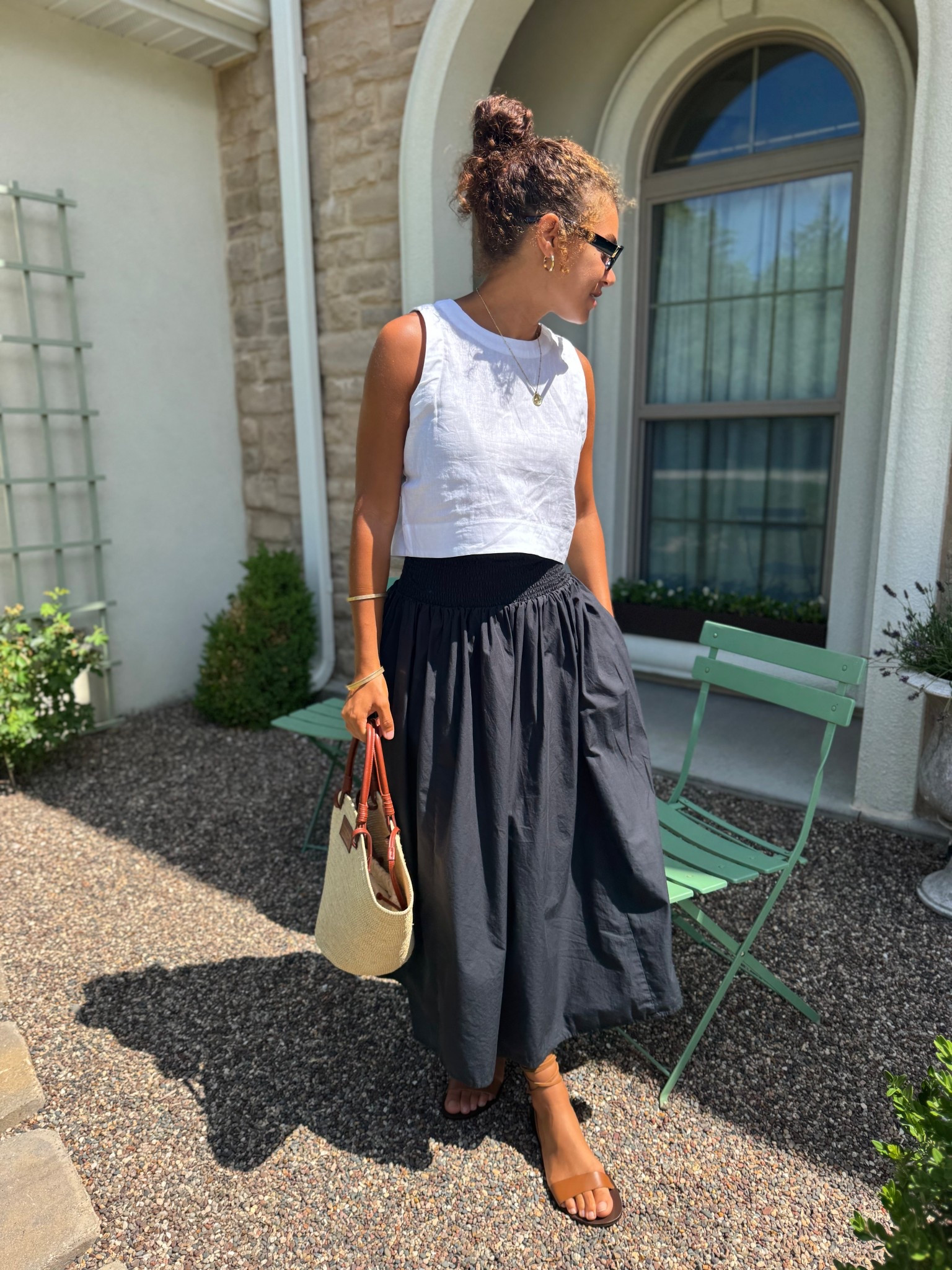 Classic summer outfit idea: linen tank, black skirt, sunglasses, lace up sandals, and a straw bag 

#LTKStyleTip #LTKSeasonal