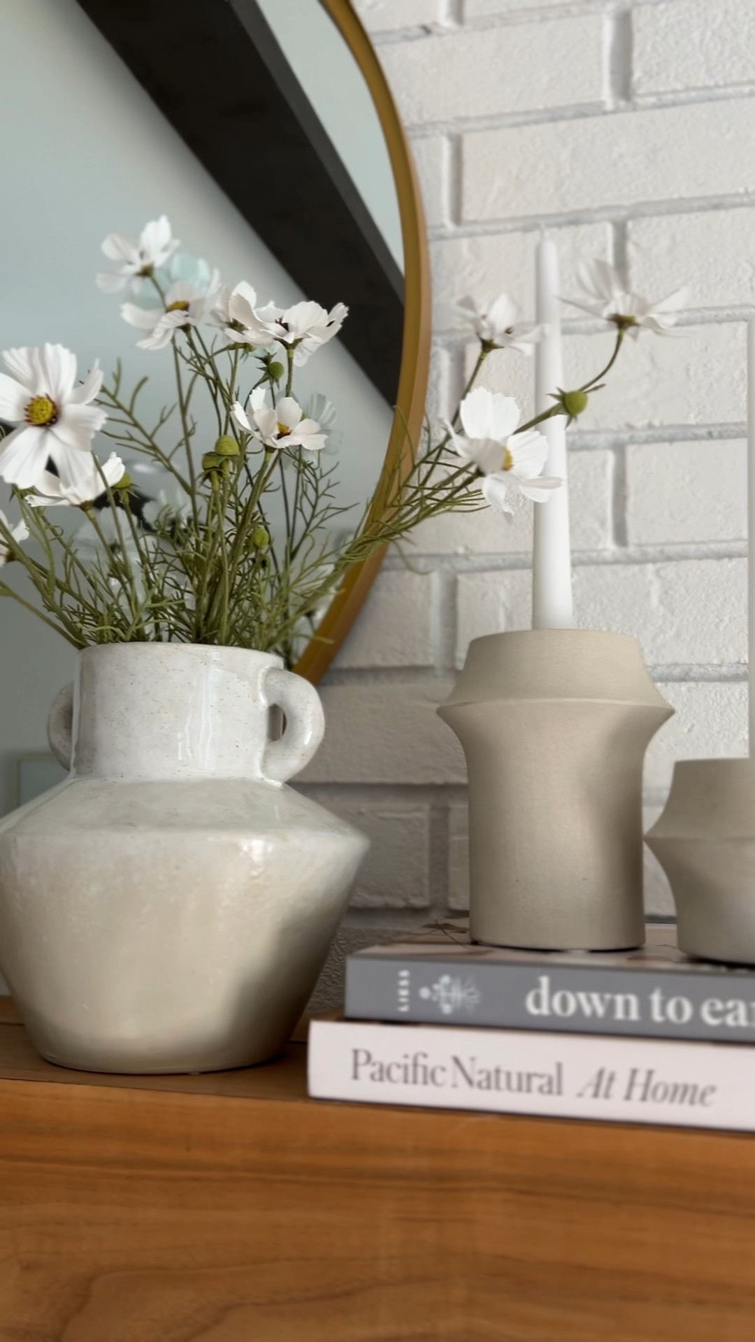 Make your house feel like home! Amazon vase, crate & barrel candle holders, target gold round mirror

#LTKFindsUnder100 #LTKStyleTip #LTKHome