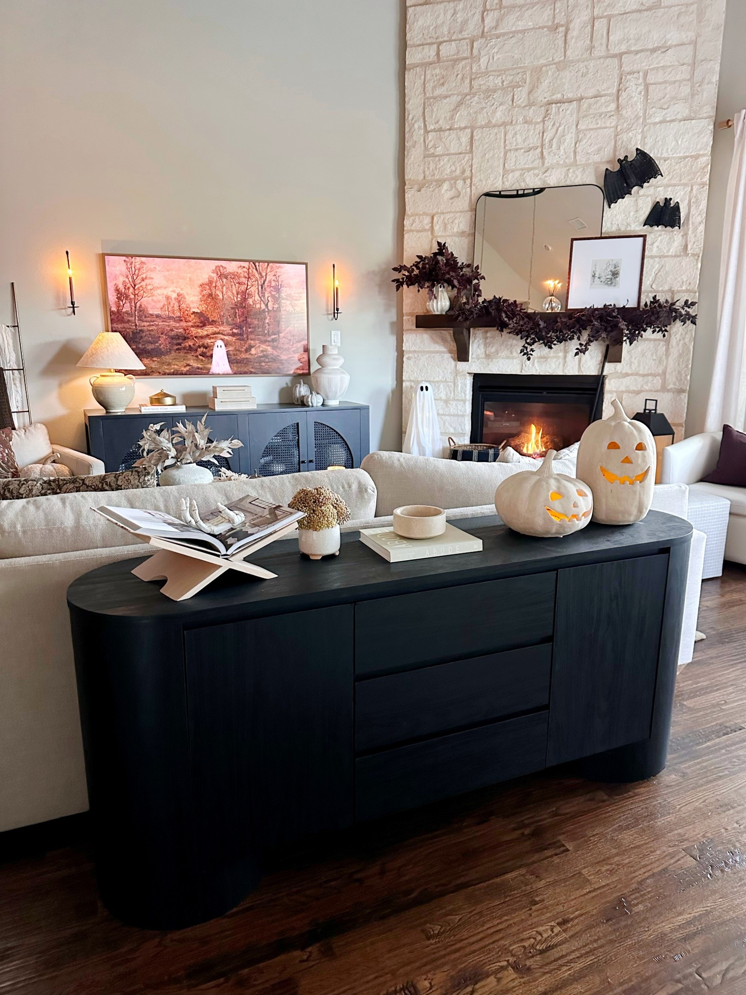 A console table that whispers spooky elegance 🖤 💀 

#LTKHome #LTKHalloween