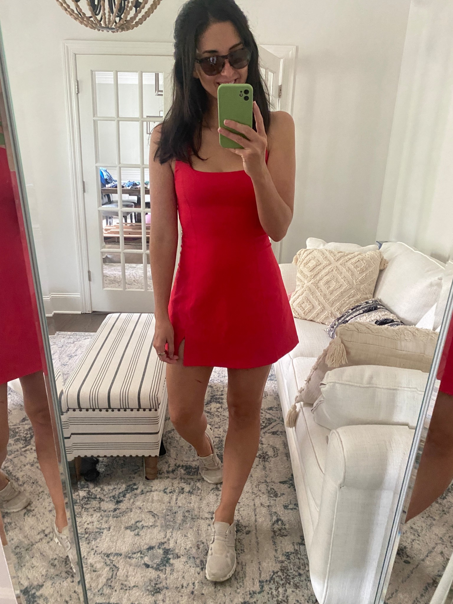Another day of chasing toddlers , another activewear outfit required. I love this red active dress with built in shorts. I wore it for 4th of July last year. I’m wearing a medium and it fits true to size. It’s also on sale!! Also wearing my go to neutral on clouds and new Oakley sunglasses. 

#LTKSaleAlert #LTKFindsUnder100 #LTKActive