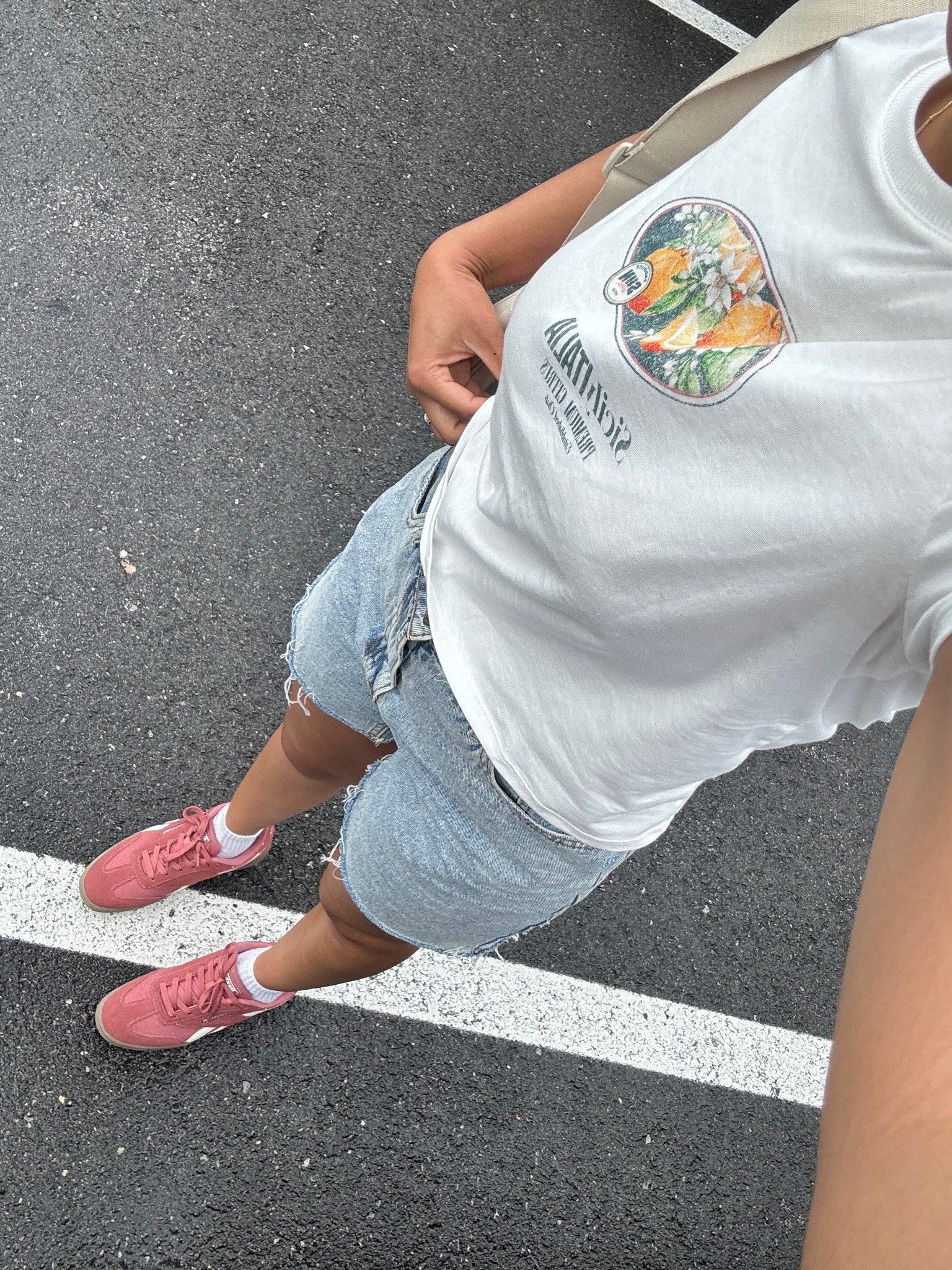 Summer outfit graphic tee and pop of color sneakers 

#LTKSeasonal #LTKSummerSales
