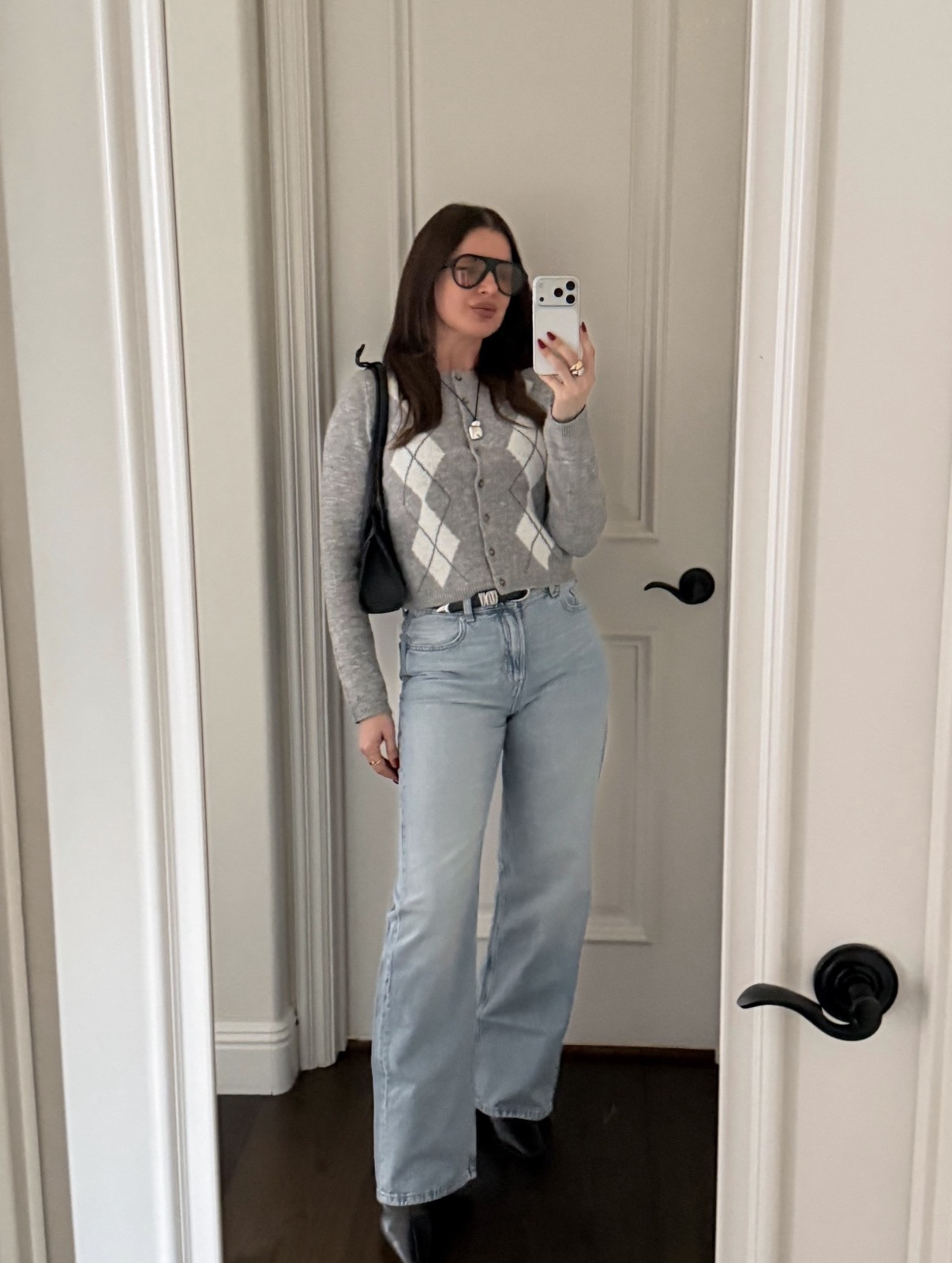 Styling an argyle cardigan with wide leg jeans and black leather loafers for fall 
#argyle #sweater #cardigan #wideleg #jeans #loafers #leather #falloutfit 

#LTKSeasonal #LTKFindsUnder100 #LTKFindsUnder50