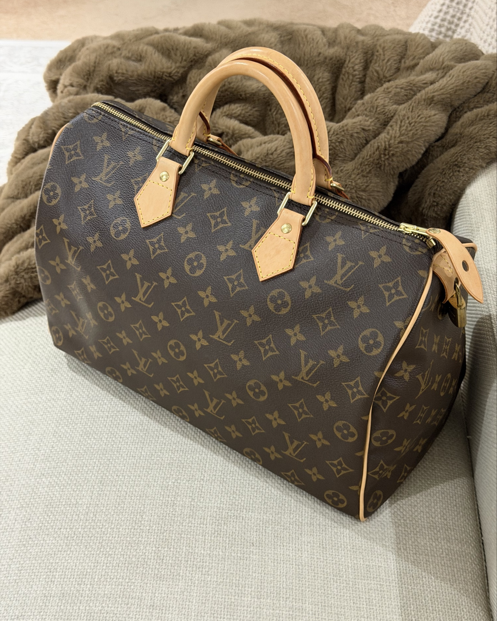 Louis Vuitton Speedy is making a comeback! My very first Louis Vuitton was the Speedy 35 pictured above. I purchased it at the Louis Vuitton store in Nashville in 2008 (I still have the receipt😉). Almost 18 years ago. 😳 I have linked several gently used Speedy bags if you have this bag on your wishlist. The Speedy will always remain classic and timeless. 👜 #louisvuitton #speedy #designerbag 

#LTKdayinmylife #LTKTravel #LTKootd
