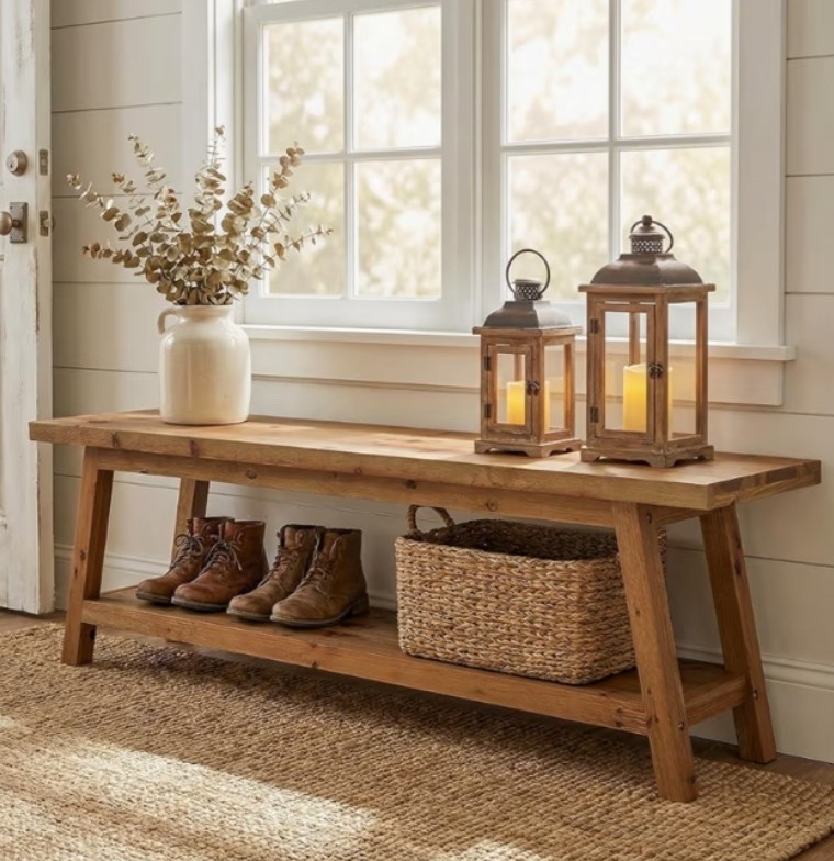 Solid wood entryway bench with that warm rustic farmhouse feel that makes a home feel instantly more welcoming and lived in. 🤎🌿 Perfect for an entryway, mudroom, hallway, window seating area, bedroom, or covered porch when you want a piece that feels both functional and beautifully simple. The natural wood finish and lower shoe shelf give it that cozy collected look while still being practical for everyday storage and seating. 

Add this bench if your home needs a warm landing spot for shoes, bags, blankets, or slow morning moments. ✨🐄

#LTKHome #LTKOver40 #LTKSeasonal