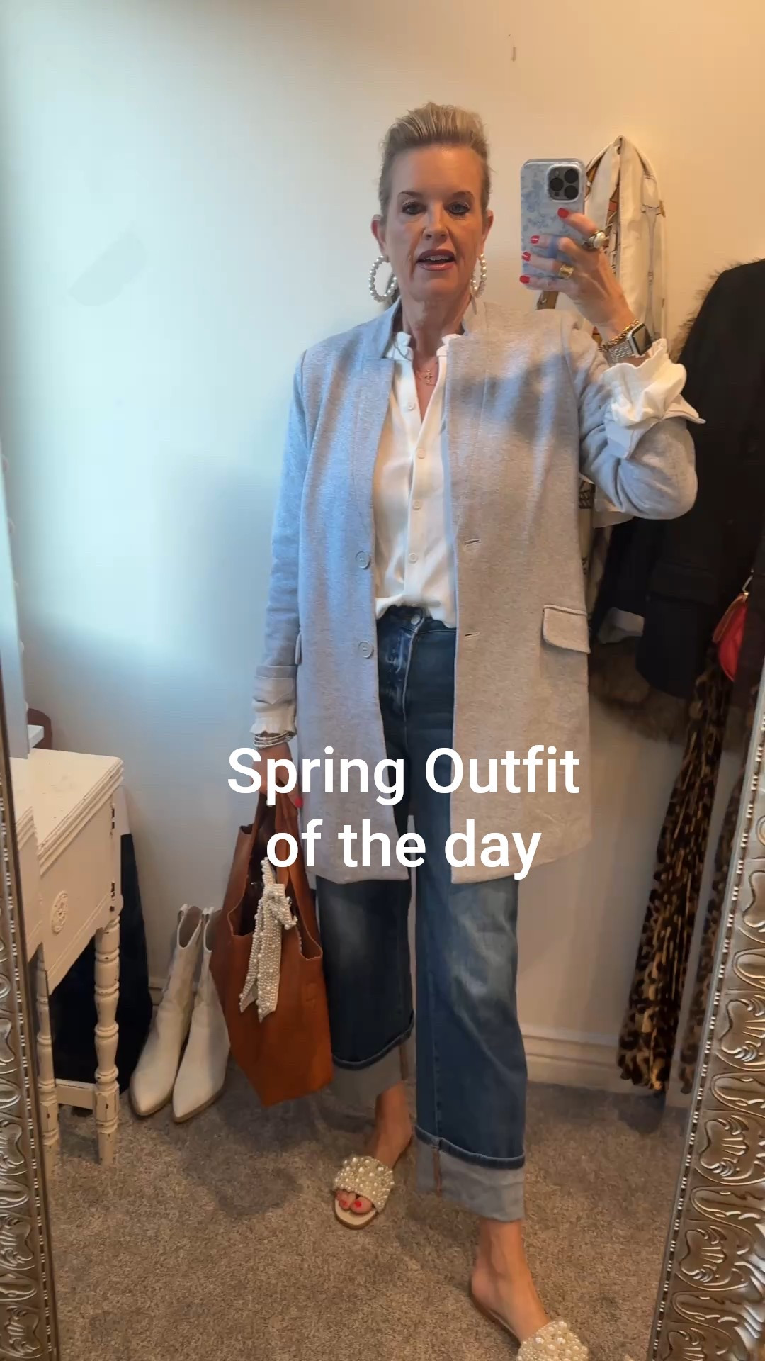 Spring outfit of the day🌷

Gibsonlook light weight blue/grey coat/cardigan with pockets and mid length. Fits true to size I am in a small

White button up top/cardigan light weight and has ruffle detail sleeves and collar. Fits tts in a small White and comes in other colors. 

Gibsonlook save 10% with code: DARCY10

Risen cuffed crop jeans mid rise and perfect for spring and summer

Pearl hoop earrings 

Pearl embellished Steve Madden slides (also linked more affordable pair

Vegan tote with pearl bow clipped to it 

Necklace Kendra Scott cross 
Opal heart abbot Lyon 



#LTKOver40 #LTKWorkwear #LTKFindsUnder100