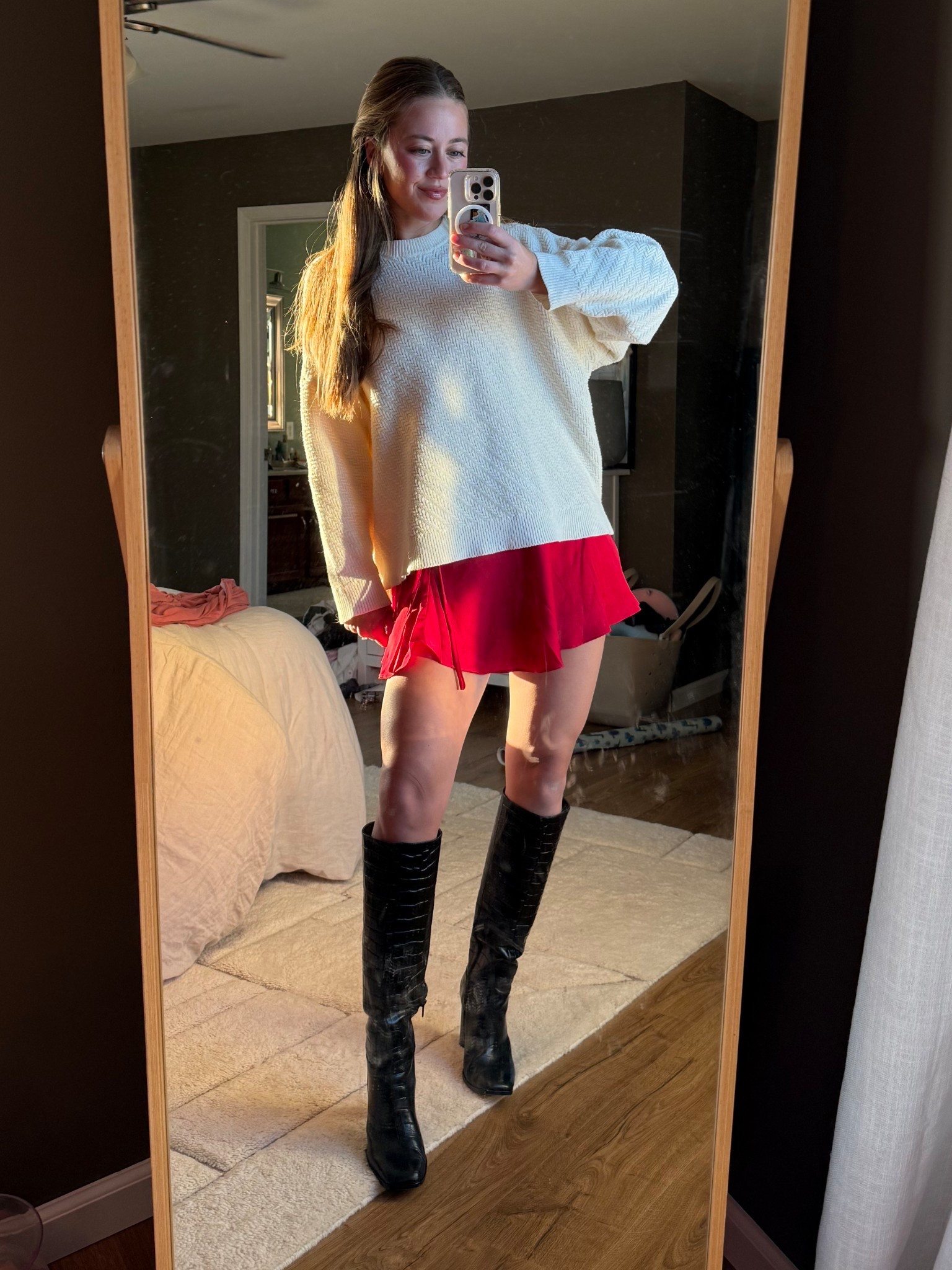 Obsessed with this skirt for all the Christmas parties!! So cozy with an oversized sweater to balance the outfit. 

#LTKootd #LTKFindsUnder100 #LTKHoliday