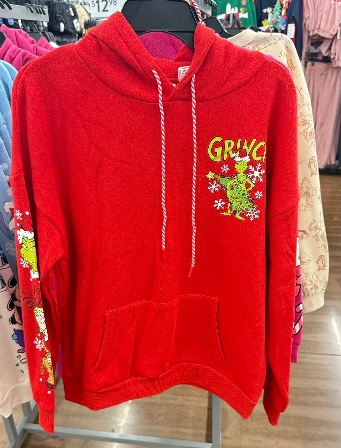 This Grinch hoodie is a cozy and casual holiday favorite, perfect for Christmas movie nights, school events, and relaxed holiday looks. Easy to throw on with leggings or jeans and ideal for last-minute festive outfits.

#LTKGiftGuide #LTKSeasonal #LTKFindsUnder50