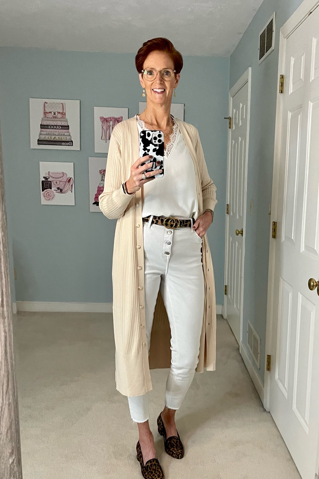 A monochromatic look for summer into fall. Add a long duster cardigan for your 3rd piece and sprinkle in a little leopard too. Classic outfit.

Duster cardigan, white top, white jeans, leopard shoes, classic outfit, fall outfit

#LTKstyletip