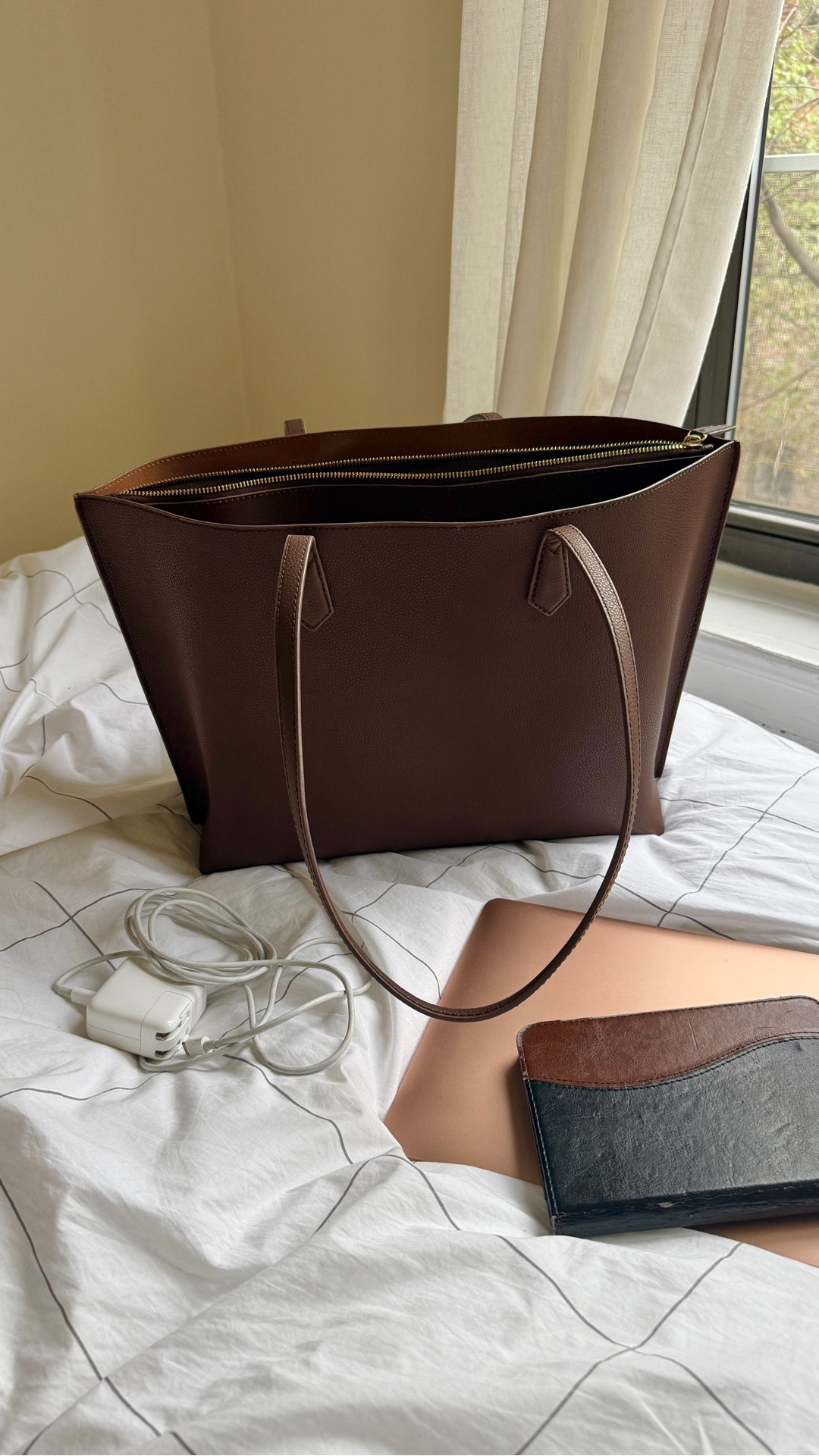 My favorite Quince work tote. Leather, lots of pockets including a zip pocket for laptop/tablet. Free shipping too. 

#LTKGiftGuide #LTKWorkwear