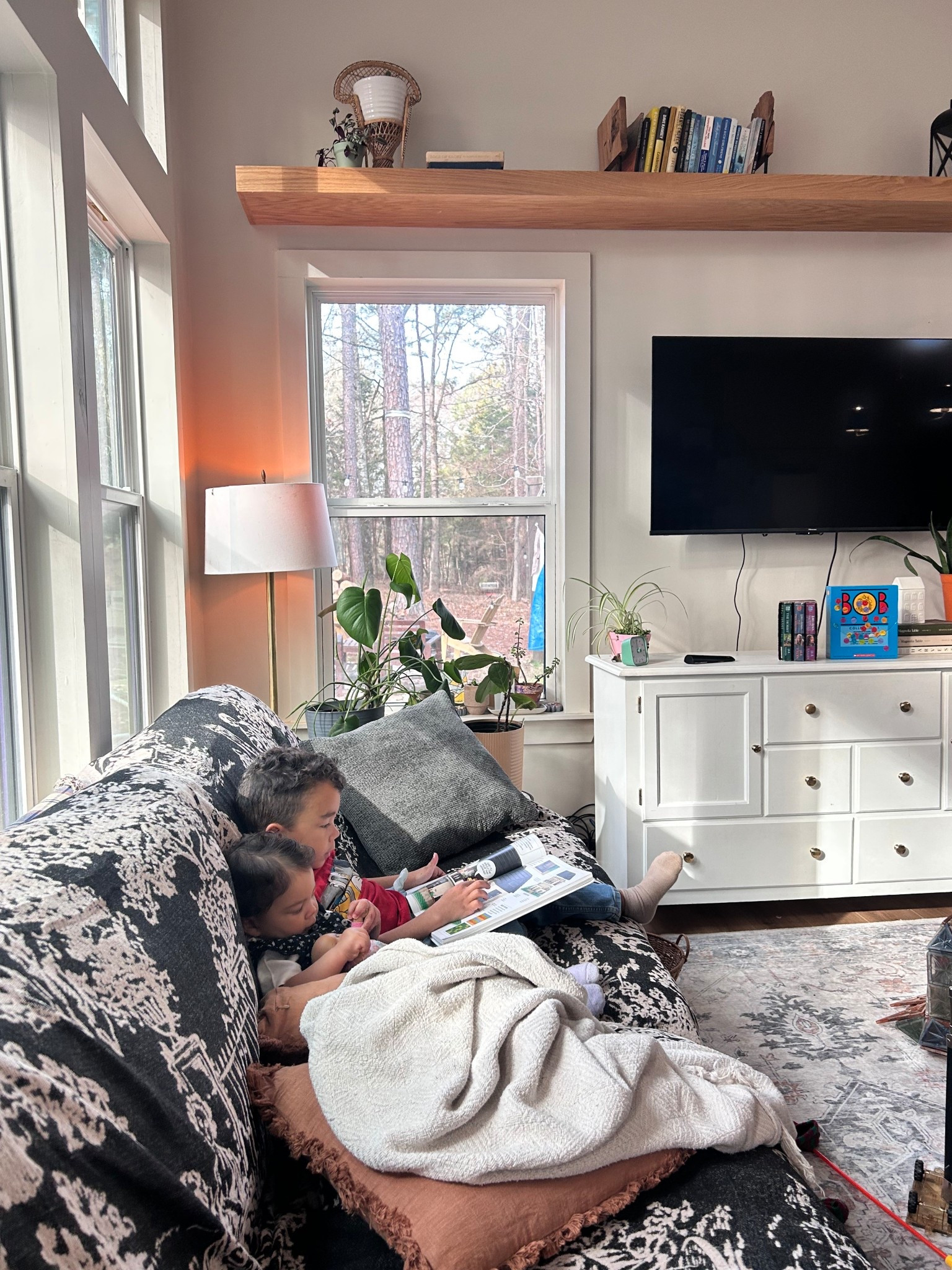 These mini moments I catch make my heart swim!

Anyone else out there have little kids close in age? 
These are my youngest two, and they are just about three years apart! 

Peep the circadian rhythm bulb in the background! We’re loving these bulbs! They set the vibe in the evenings and help us all wind down quickly.

#LTKdayinmylife #LTKHome #LTKmomlife