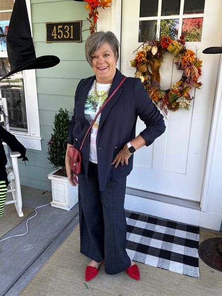 Navy jacket, graphic t-shirt, @oldnavy high waisted wide leg pull on pixie pants. @hobo red crossbody bag, red suede flats 

#classicstyle #navyjacket#graphictshirtstyle #chicover60 #fashionover50 #styleatatacertainage #

#LTKover40 #LTKstyletip #LTKsalealert