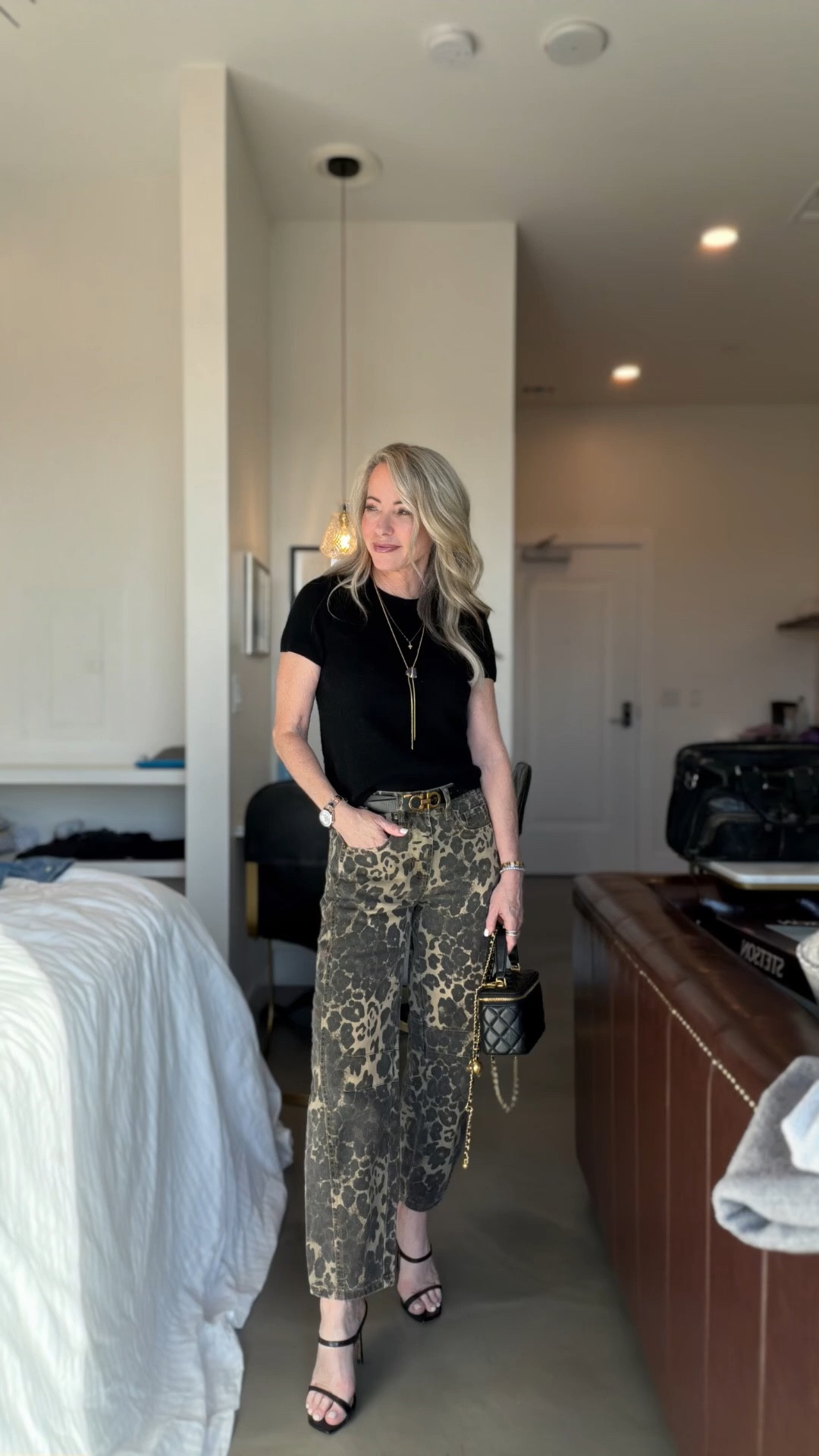 Leopard denim styled with a classic black tee, gold accessories, and heels for an easy elevated look. Statement jeans made simple. 🐆✨

#LTKgrwm #LTKOver40 #LTKootd