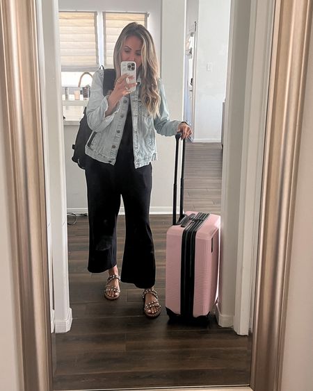 Travel outfit! A comfy jumpsuit with a denim jacket is my go to for the plane. This jumpsuit from Amazon is wayyyyy cute. Runs true to size, slightly large. I’m wearing it in a small. Sandals are amazon find too, wearing my true size. My carry on rolling bag and backpack are must haves as well! 

#LTKfit #LTKitbag #LTKunder50