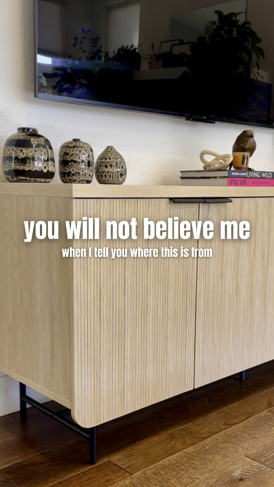 This stunning console is only $324!!! I snatched it up when looking for something *budget friendly* for my basement and am honestly shocked by its quality!

It comes in light oak (pictured), black, and walnut  

#LTKsalealert #LTKVideo #LTKhome