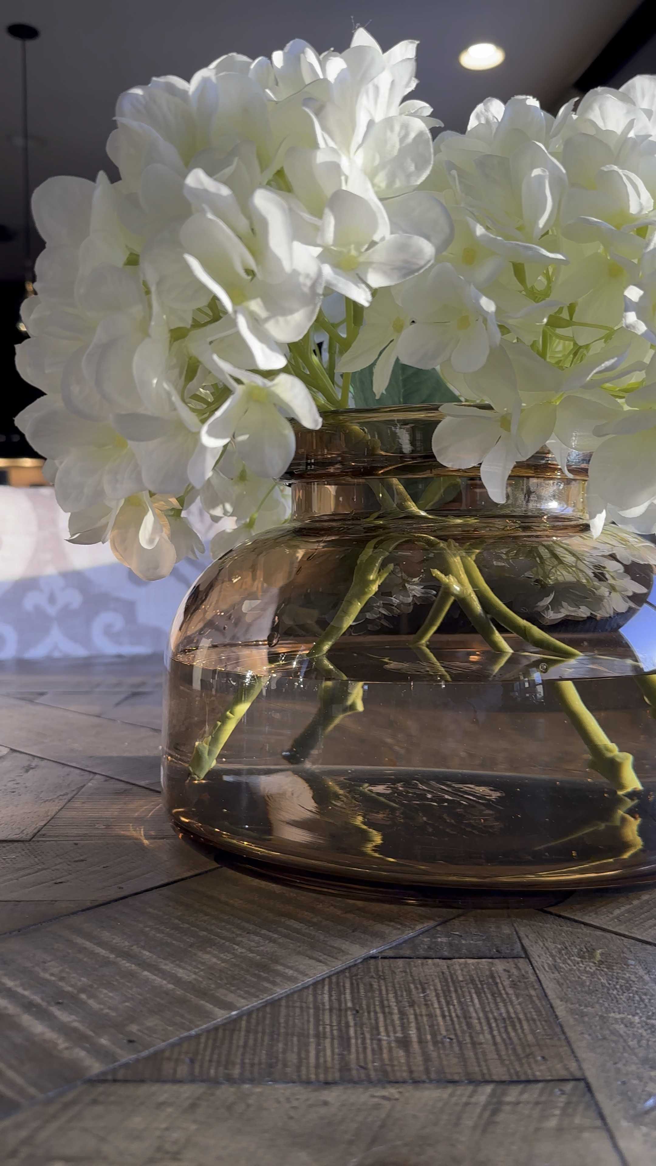 Hi. 👋 I’m just over here making my own rules.  I recently found this beautiful vase at Target and along with some beautiful faux hydrangeas, I thought let’s make them look real with water! It’s absolutely beautiful. All is the products work so well together. 

Have you done this before? 

xoxo, Kristin 🫶🏼 follow for more rule breaking ideas! 😉

#LTKhome #LTKVideo #LTKSeasonal