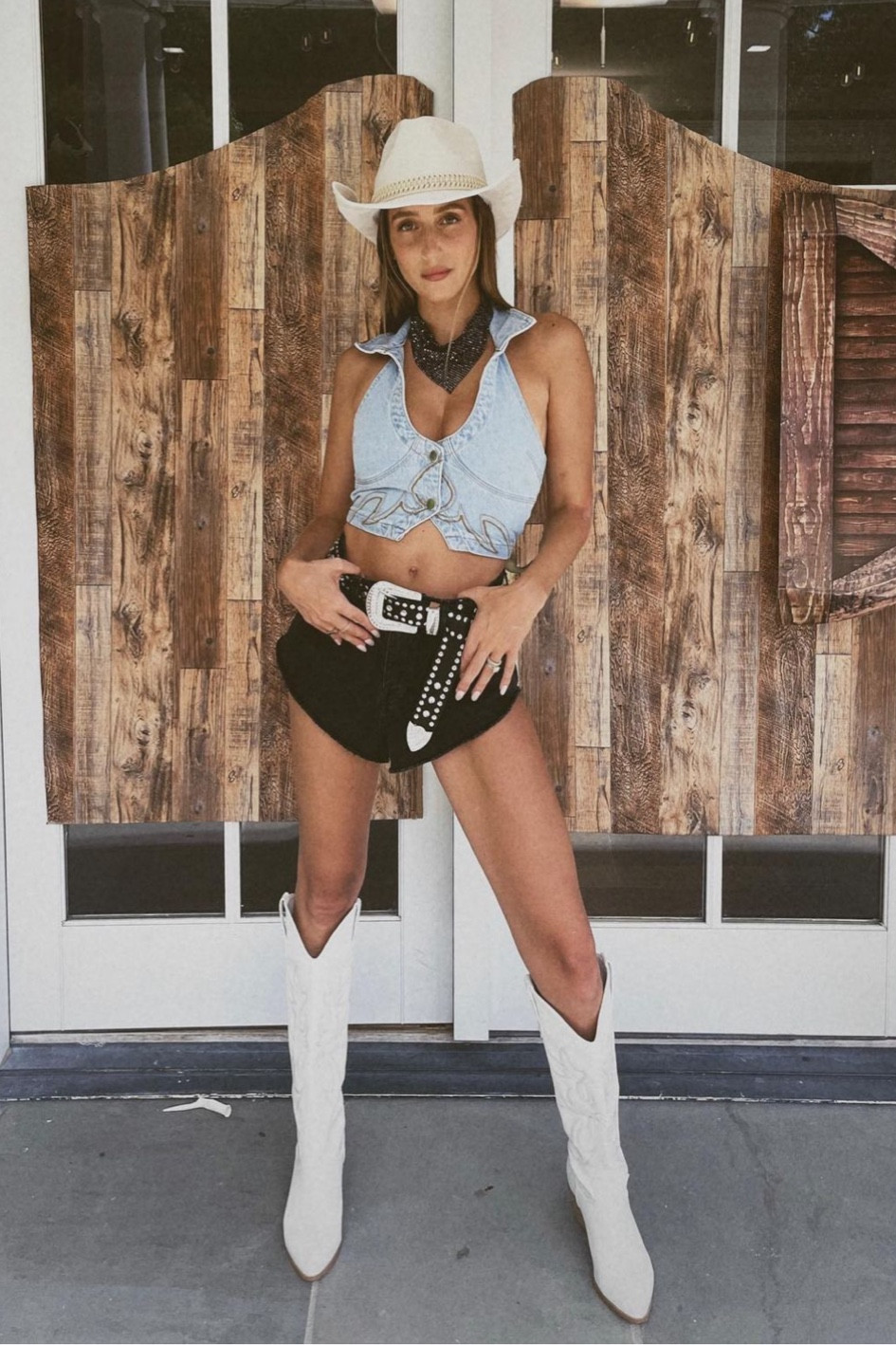 Amanda Batula's black sequin bandanna, black cut off denim jean shorts, denim vest, white cowboy boots, white cowboy hat, rhinestone belt

#LTKFestival #LTKstyletip #LTKFind