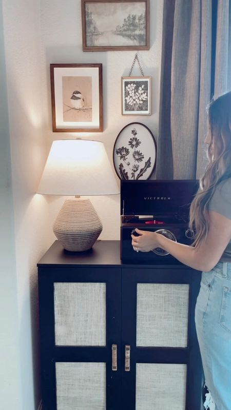 All art is from hobby lobby and the cabinet is an ikea hack. Cozy living room corner styling, table lamp, record player 

#LTKunder50 #LTKhome