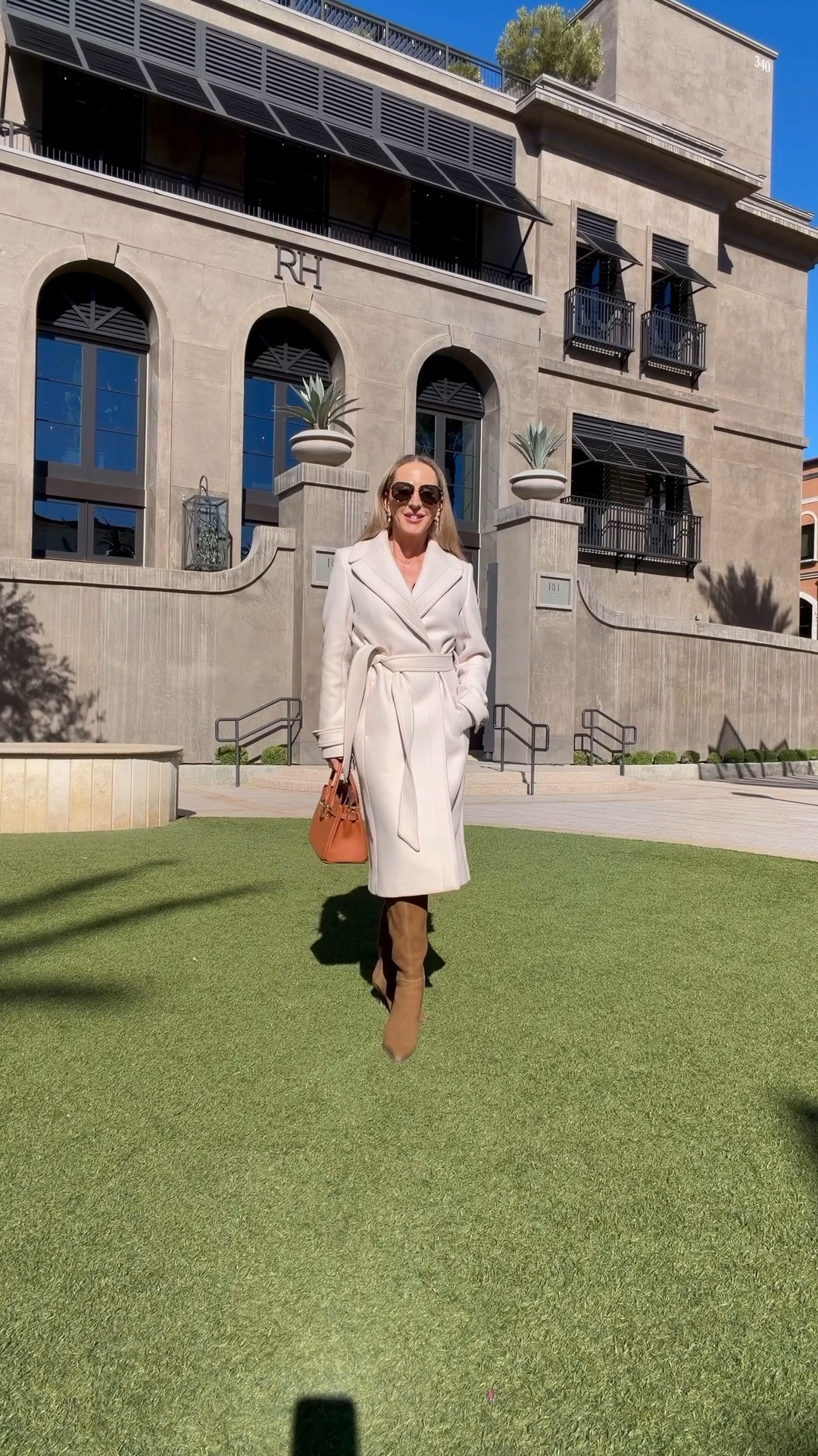 Fall outfit / winter outfit idea chocolate brown is the new butter yellow: long cream coats always look chic and stylish, add some brown suede knee high boots to keep it fashion forward and you’re good to go. I used tortoiseshell sunglasses to tie in some more browns. I find the brown heel boots run true to size and find them really comfortable. #OOTD

#LTKStyleTip #LTKShoeCrush #LTKPetite