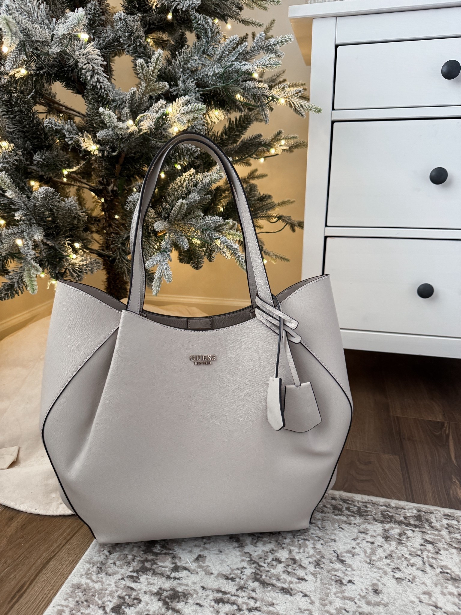 Love my new @Guess Amorette tote bag! It is so chic, functional and affordable! It is so spacious and also comes with a removable clutch!
#ad #GUESSPartner

#LTKGiftGuide #LTKHoliday