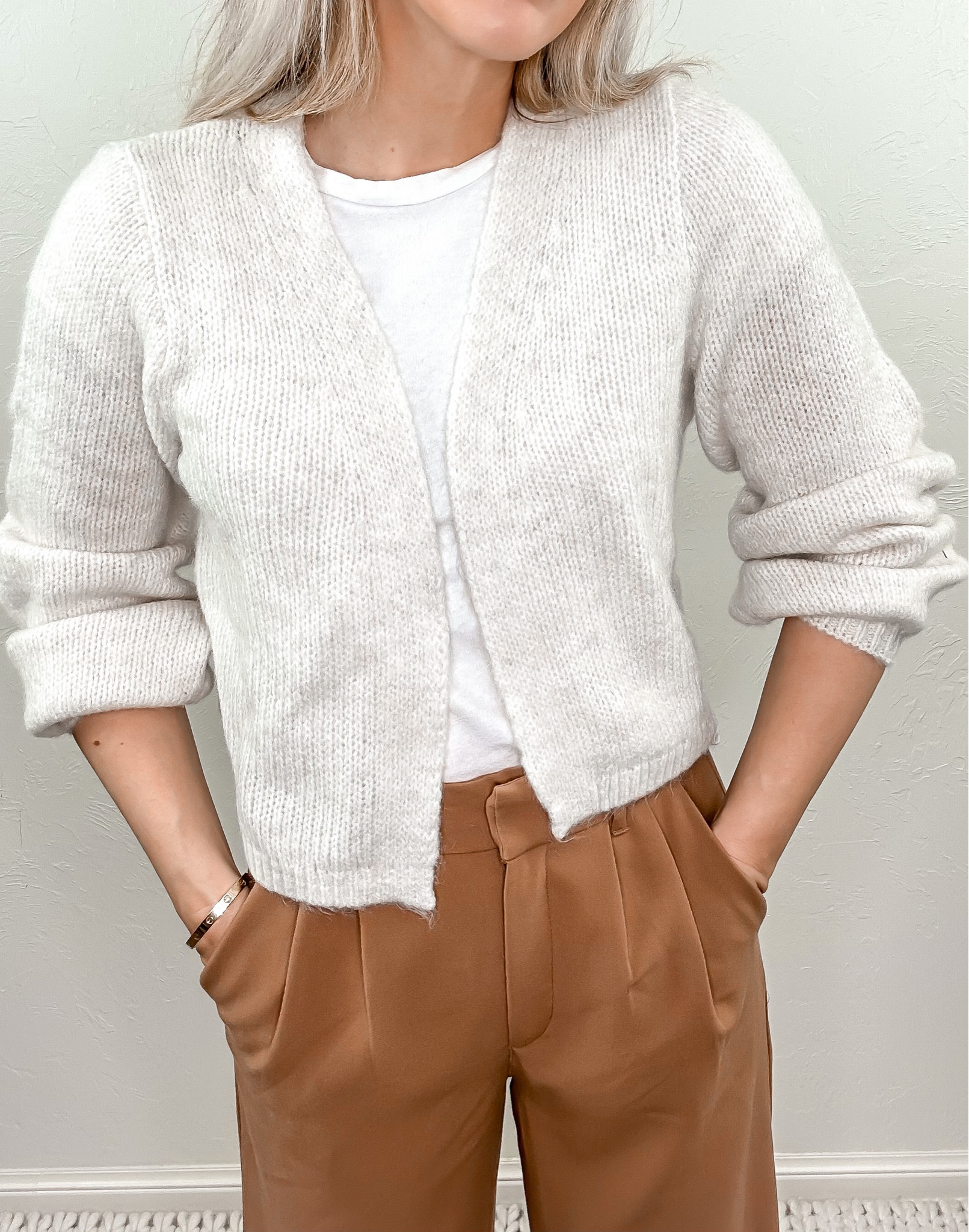 White cardigan 
Pleated pants 

#LTKstyletip #LTKunder100 #LTKFind
