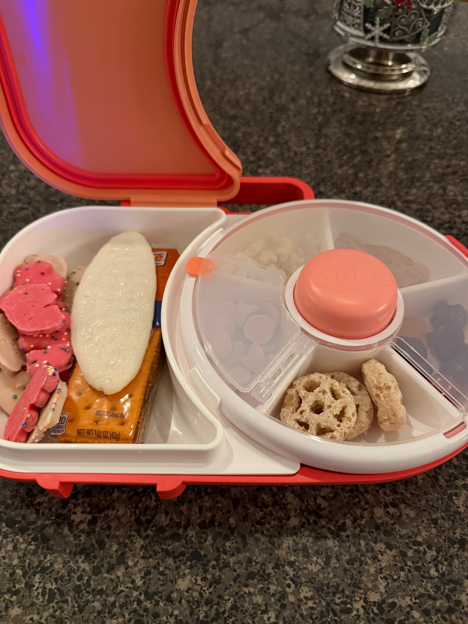 Snack container for on the go. Great travel hack for kids. Toddler must have. Baby must have. Target find.

#LTKfoodie #LTKTravel #LTKFindsUnder50