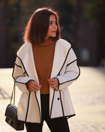 White Coat Brown Sweater Leggings Outfit Black Lace up Chelsea Boots Black Chanel Classic Bag Autumn looks Simple Autumnal Outfits Fall Outfits Petite Style Winter Look Cosy Outfit Comfy Outfit

#LTKSeasonal #LTKstyletip #LTKeurope