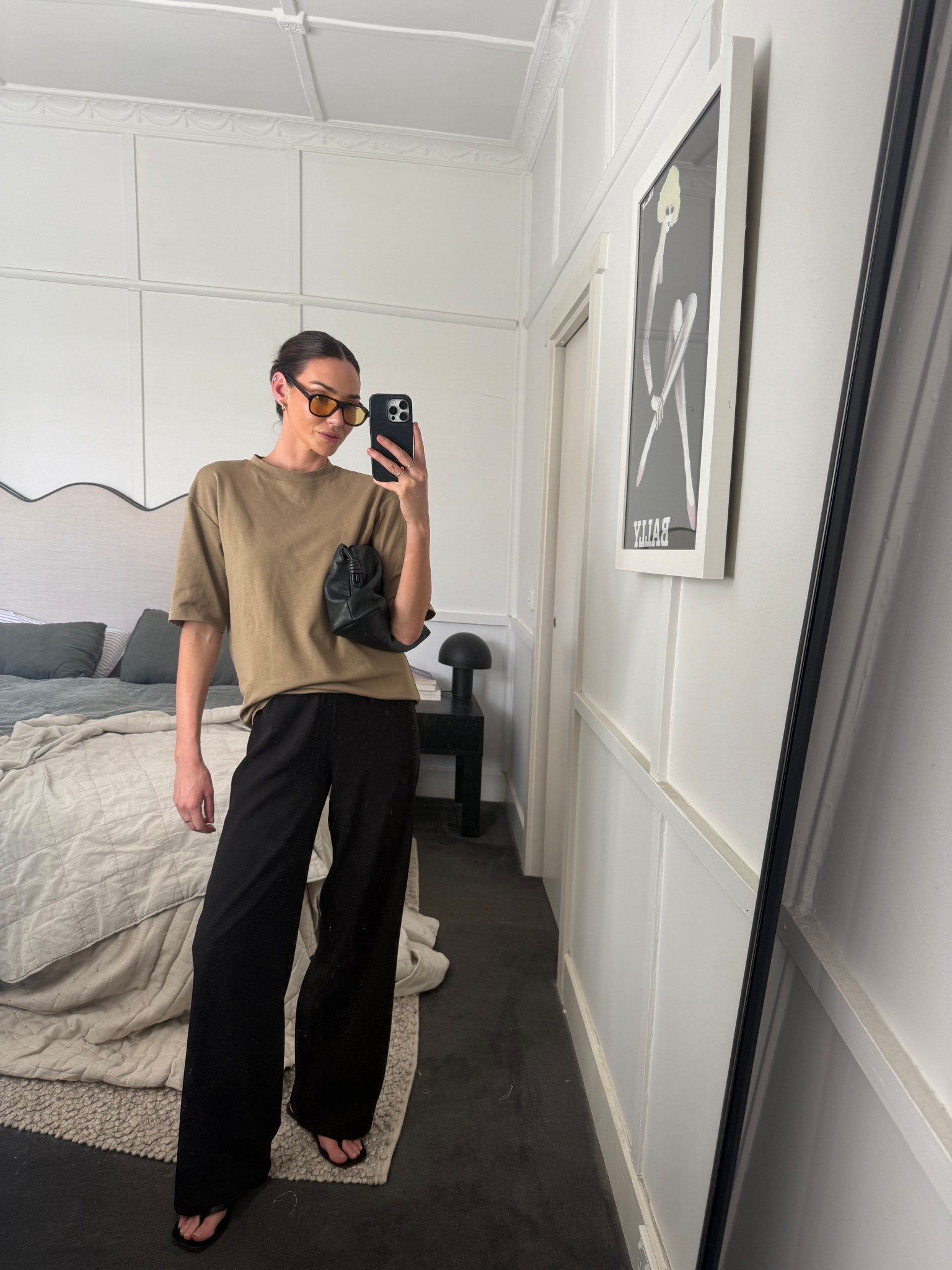 My everyday uniform 

Harris tapper black trousers 
Oversized clay tee shirt 
Black thongs 
Black leather bag 
Oversized sunglasses 

#LTKsummer #LTKstyletip #LTKaustralia