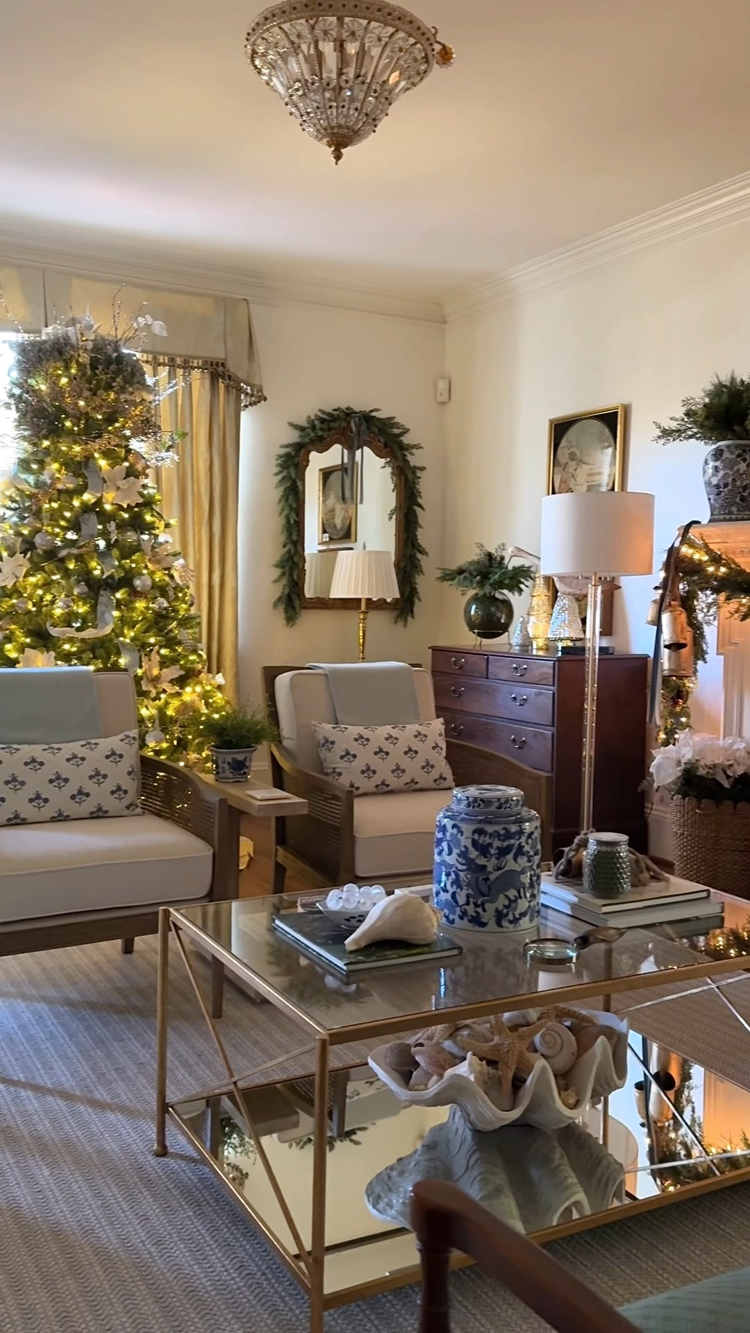 It’s beginning to look a lot like Christmas in the living room! 🎄✨ I kept a similar vibe to last year, blending golds, silvers, soft blues, and creams to complement the room’s palette. For the mantel, I layered my garland the same way but switched things up by featuring my collection of mercury glass Christmas trees—so sparkly and timeless! ✨ Instead of the nativity scene on the mantel, I placed a smaller one on the chest against the wall for a fresh touch this year. There’s just something magical about seeing it all come together! What colors are you decorating with this season? 🎄✨🦌

#ChristmasDecorInspo #TimelessChristmas #DeckTheHalls

#LTKHoliday #LTKSeasonal #LTKHome