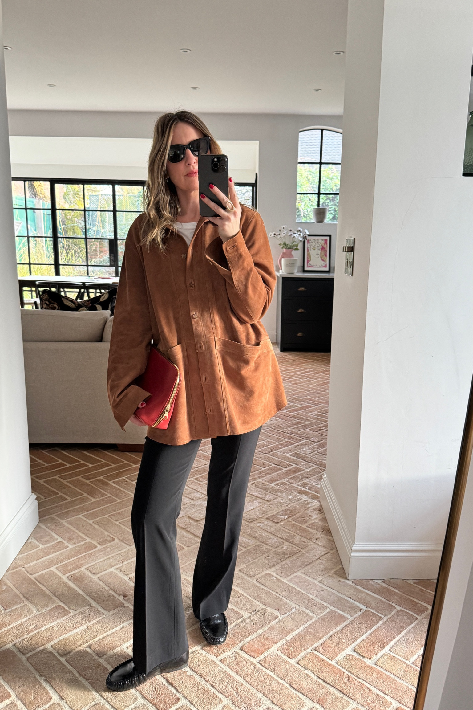 Suede Jacket + Black Tailored Trousers + Red Clutch Bag + Loafers 

#LTKstyletip #LTKworkwear #LTKuk