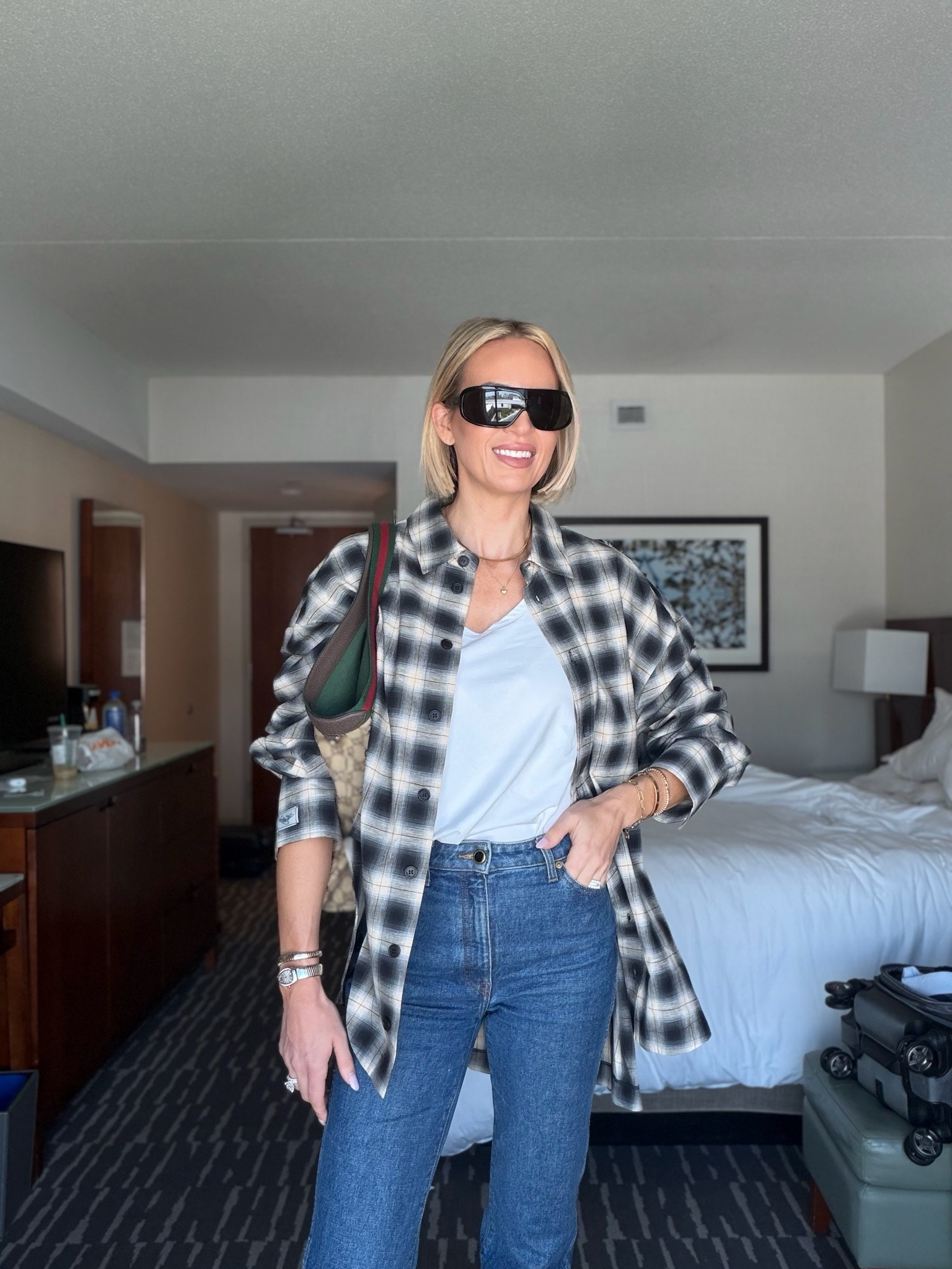 Wearing a small in the target tank. Jeans run tts and are tall girl friendly.  i’m wearing a size 40 in the top. It’s already very oversized. I probably could’ve sized down one size. 

#LTKootd #LTKTravel #LTKTall