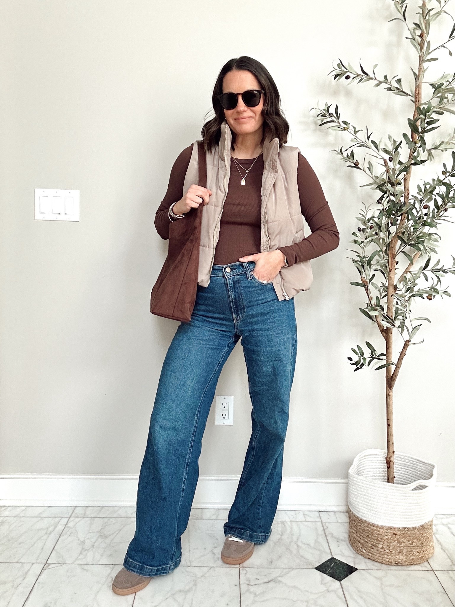 Mom outfit of the day!  Puffer vest runs true to size, ribbed long sleeve runs true to size and wide leg jeans run a tad big.



#LTKootd #LTKFindsUnder50 #LTKOver40