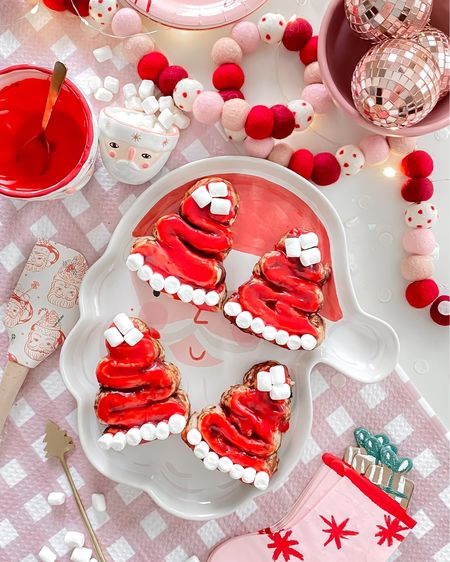 Santa Hat Cinnamon Rolls 

The perfect breakfast for Christmas morning or make them for a Christmas party.   Use red food coloring to turn the icing red and mini marshmallows for the Pom & trim. 

My favorite cinnamon roll brand is Annie’s.  

#christmas #christmaskitchen #cinnamonrolls #santatray #christmasdessert 

#LTKfamily #LTKkids #LTKHoliday