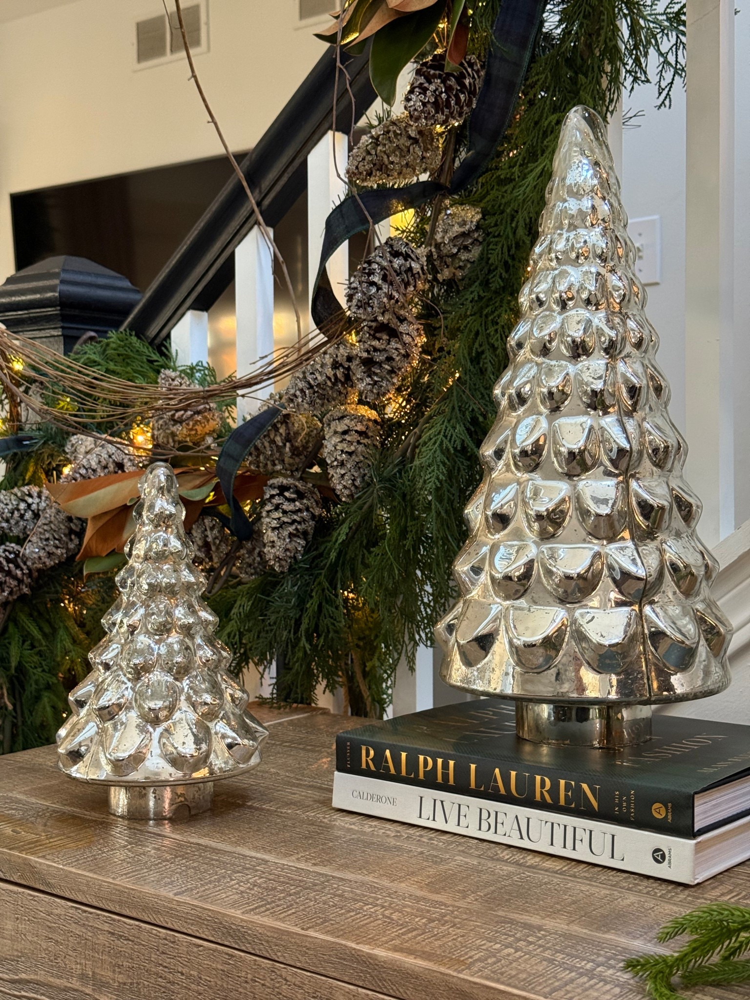 My Pottery Barn Mercury glass trees are discontinued, but you can find similar ones on sale linked here.

#LTKHome #LTKHoliday #LTKSaleAlert