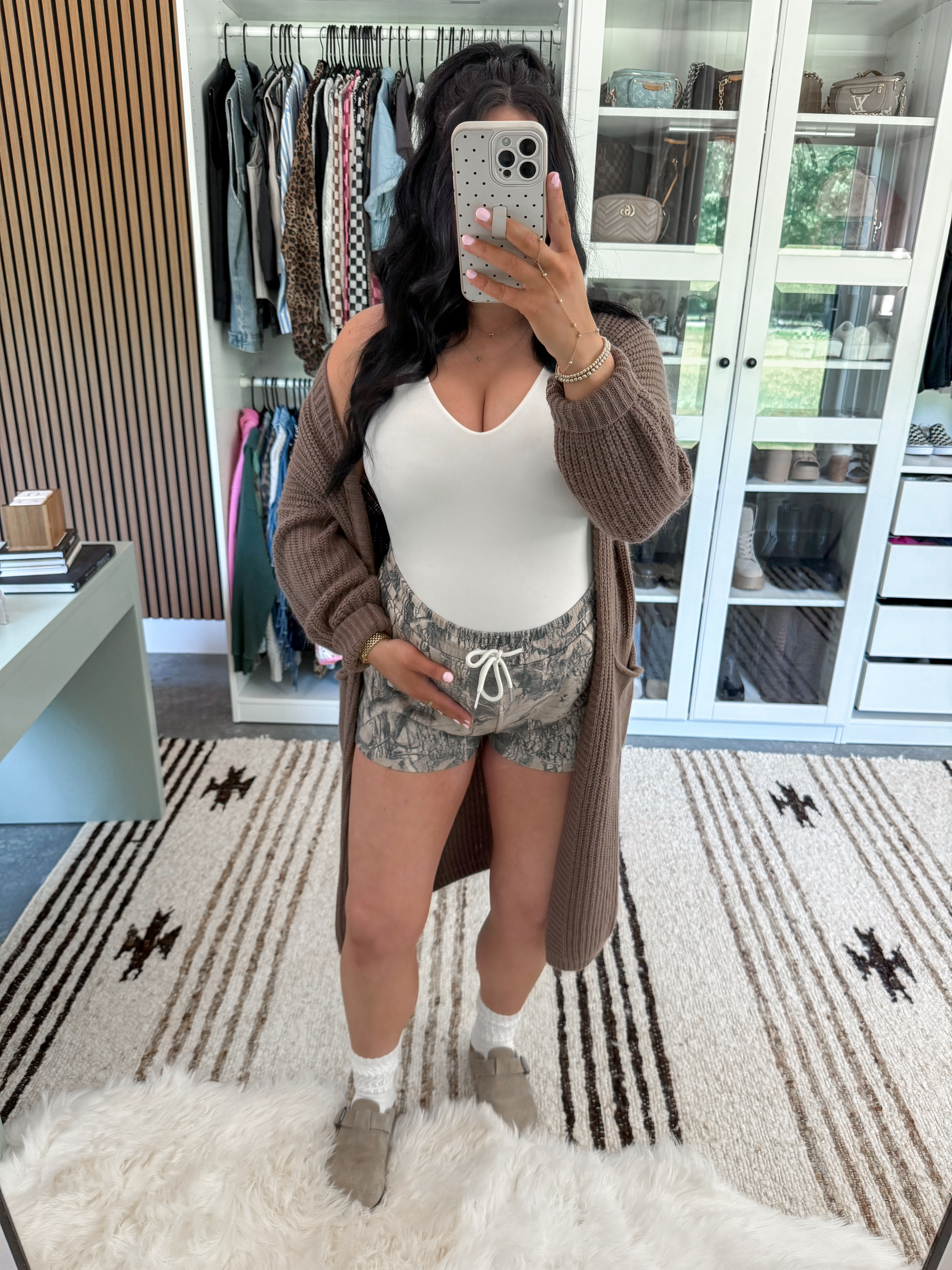Comfy Bump Friendly Spring OOTD 🤍

Bodysuit - medium
Cardigan - small (nutmeg color)
Shorts - small (dark green color)

You can never go wrong with some comfy lounge shorts, a cozy duster cardigan and some slouch socks! Finished this look with a basic white bodysuit & my amazon clogs!

#LTKootd #LTKSeasonal #LTKBump