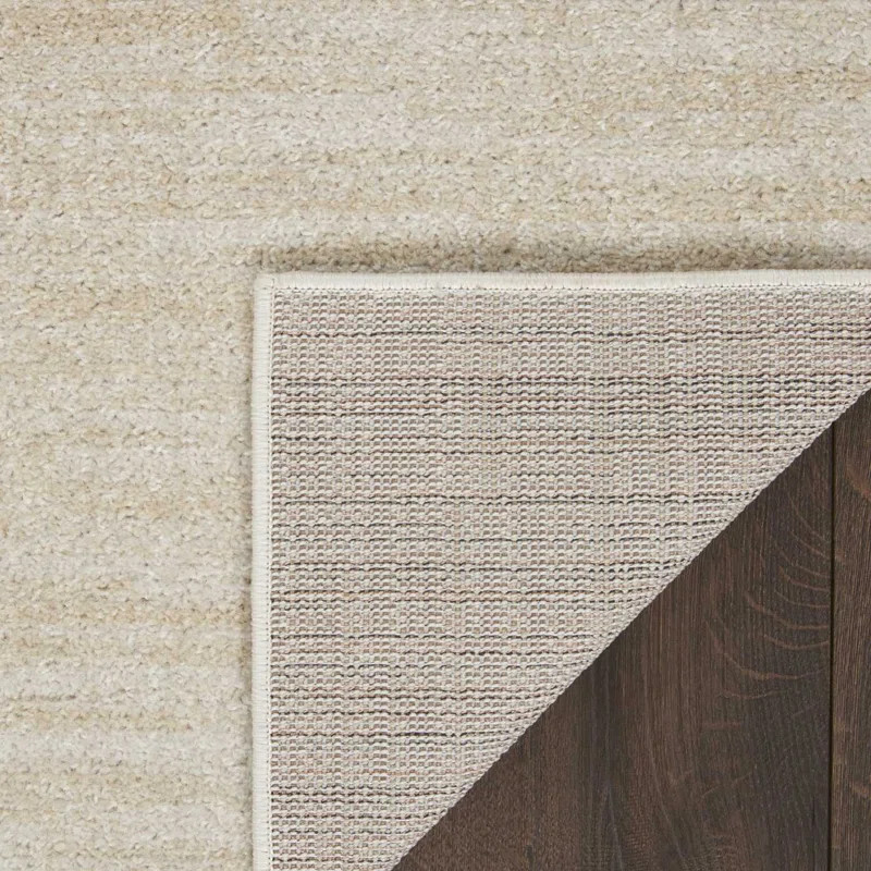 Mullican Sandy Solid Ivory/Beige Easy Care Area Rug | Wayfair North America
