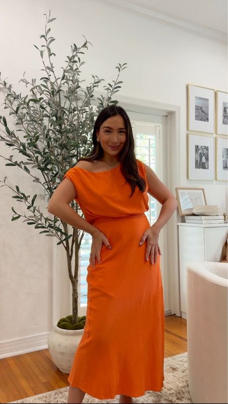 The cutest orange midi dress! Wearing a. Medium! 

#LTKFindsUnder100 #LTKStyleTip