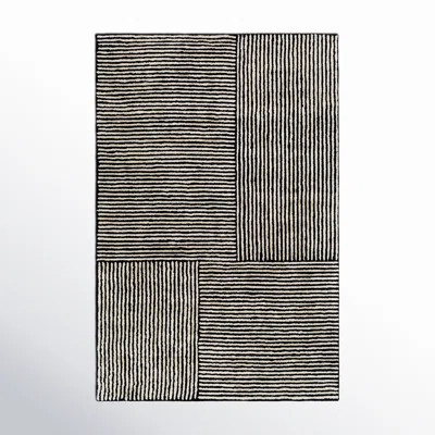 Balos Hand Tufted Black/Ivory Rug | Wayfair North America