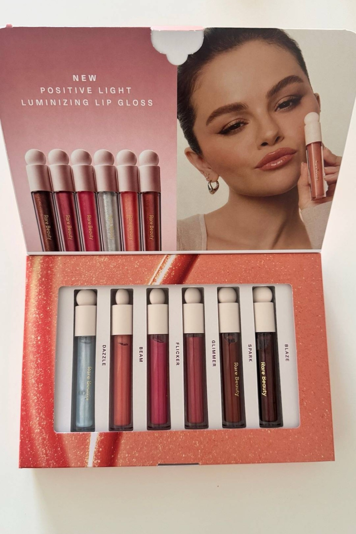 Have you tried these yet? New rare beauty by Selena Gomez positive light luminizing lip gloss. Love these shimmery glosses that give the most stunning prismatic shine! … For more links to elevated basics clothing, georgia louise1, wedding guest dress, kathleen post, fall purse, jeans, fall outfits, follow me on LTK! ✨

#LTKBeauty #LTKFindsUnder50 #LTKSeasonal