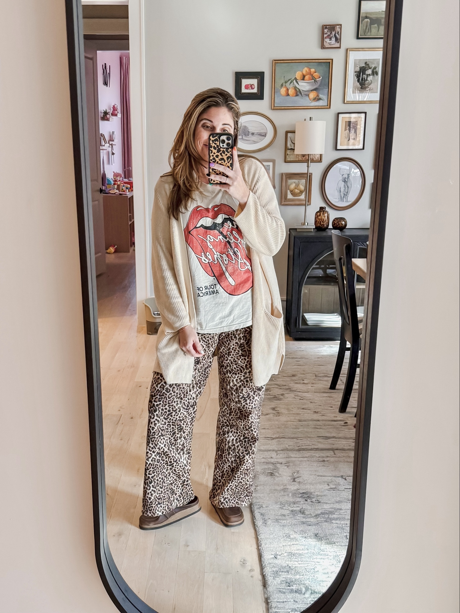 There’s just something about leopard jeans and a graphic tee that I love! Cozied it up with an oversized cardigan 
Tee L / Cardigan L / Leopard wide leg jeans 12 / Clogs tts 

#LTKStyleTip #LTKMidsize #LTKootd