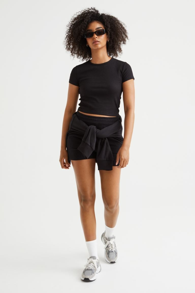 Conscious choiceCropped, fitted top in soft ribbed jersey with a round neckline and short sleeves... | H&M (UK, MY, IN, SG, PH, TW, HK)