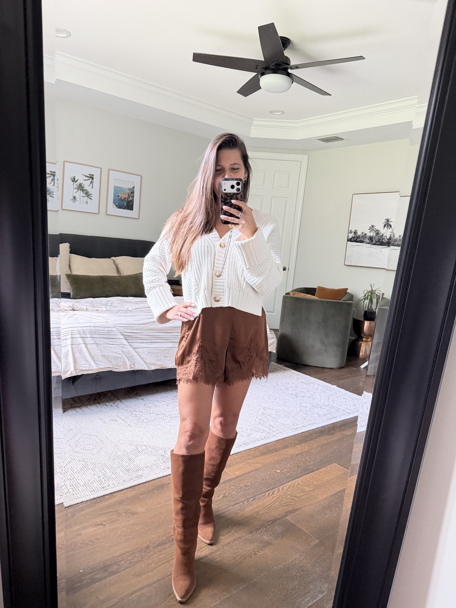 Florida fall outfit, solved. Satin lace trim shorts, a chunky cream knit cardigan, and tall cognac suede boots. You still get all the fall colors and so much texture (knit, satin, suede), and that texture is why it photographs high end. Perfect for fall family photos in a warm climate, Thanksgiving, or girls night. And you can wear every piece again. Which one are you trying first? 👇🏻

 satin shorts outfit, lace trim shorts, chunky knit cardigan, cognac suede boots, tall boots outfit, fall outfit for warm weather, Florida fall outfit, fall family photo outfit for women, Thanksgiving outfit, girls night outfit, fall texture outfit, Amazon, Abercrombie