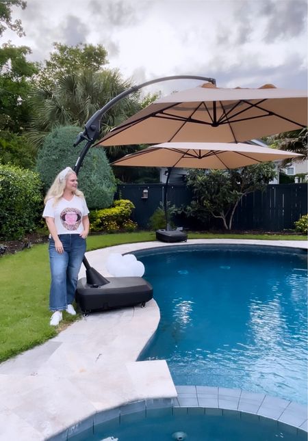 We searched and searched for new pool umbrellas that would cover a large area in the brutal afternoon sun. These are HUGE, had great reviews, and so far- we love them. 

We filled the bases with sand and water and we love that they have wheels so we can love them. 

Hit that 🔔 so you never miss a new post. 

#outdoorliving #poolumbrellas #outdoorfurniture 

#LTKHome