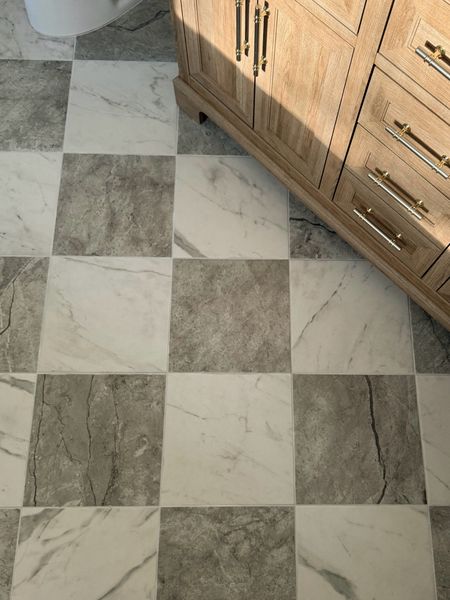 Checkerboard tile. Checkered flooring. Checkerboard floor. Bathroom flooring. 

#LTKstyletip #LTKhome #LTKsalealert