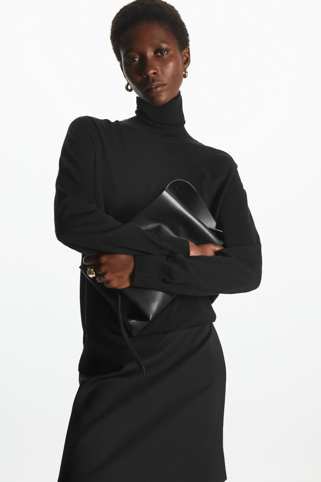 MERINO WOOL ROLL-NECK JUMPER
                        
						€ 79,00 
	                        ... | COS (EU)