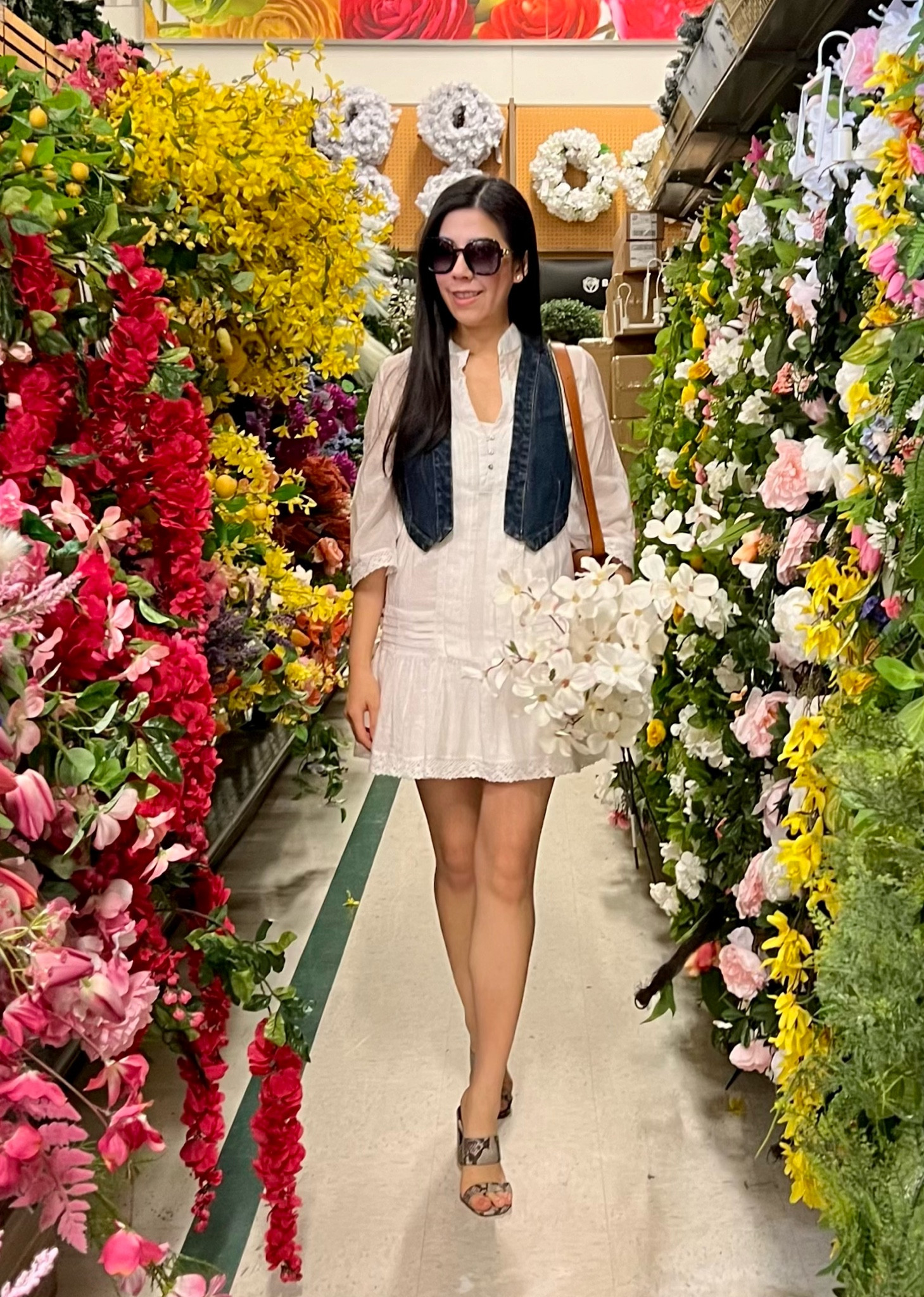 Warmer weather calls for boho chic style. I paired this sheer little white dress with a cropped denim vest and snakeskin double strap heels for an afternoon out. I visited Joann’s to see if I could snag some deals before they close. I used to spend so much time at their fabrics and crafts stores especially during the holidays! Sad to see them go! 

#bohochicstyle #littlewhitedress #denimvest 

#LTKSeasonal #LTKPetite #LTKFindsUnder100