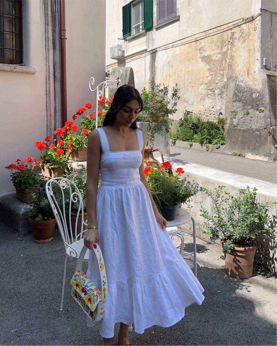 White linen dress and beaded shoulder bag 💕

#LTKstyletip #LTKSeasonal #LTKtravel